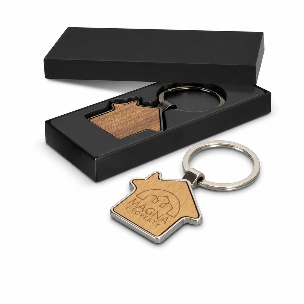 Schlüsselanhänger aus Metall in Hausform mit Geschenkbox